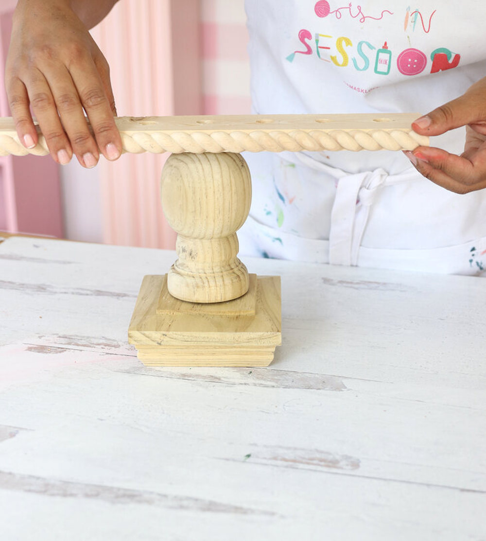 Secure wood board on top of finial 